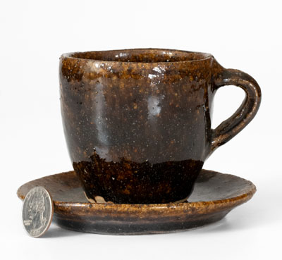 Very Rare Alkaline-Glazed Stoneware Cup and Saucer, probably Buncombe County, NC, late 19th century