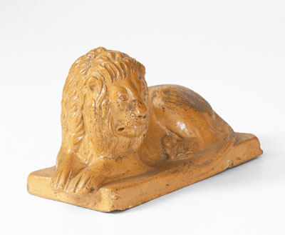 Molded American Stoneware Reclining Lion Figure, 19th century